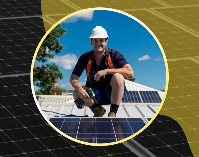 man fixing solar panels